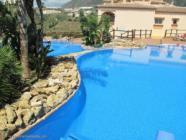Luxury holiday rental apartment in Mediterra urbanization Benalmadena with sunny terrace, sea views, communal pool and wi-fi